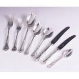 A part canteen of EPNS King's Pattern cutlery by Butler, comprising four serving spoons, 22cm