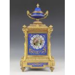 A late 19th century gilt metal and porcelain mantel clock by Pinchon Fils Aine, the case
