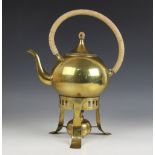 A Jugendstil brass kettle and stand, the kettle of spherical form with caned loop handle and knop,