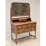 A William and Mary style mahogany dressing table, early 20th century, the shaped rectangular