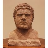 A moulded reconstituted stone bust of a classical male, modelled with curly hair and beard upon an