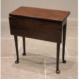 A George II mahogany folding tea table, the rectangular top with a drop leaf and a fold-over leaf,