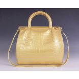 A Kwanpen Raffles gold crocodile handbag, with double top handle and attached single shoulder strap,