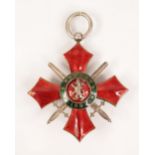A Bulgarian Order of National Merit Military Division medallion, decorated in red and green