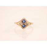 A continental 14ct gold diamond and blue gemstone set ring, the white metal diamond shaped head