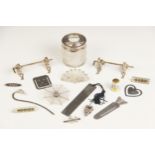 A selection a silver, silver coloured and base metal accessories, to include a novelty silver