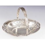 An Edwardian silver swing-handled basket, Mappin Brothers, London 1901, of oval form with pierced