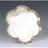 A silver tray, Lowe & Sons, Chester 1962, of plain polished hexafoil form, 25.3cm diameter, weight