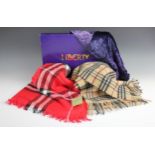 A 'Burberry' style lambs wool scarf, with tassel detail, labelled 'Burberry, London',