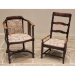 A 19th century fruit wood ladder back country chair, the turned arms enclosing a later upholstered