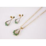 An emerald and diamond 9ct gold pendant and earring suite, the pierced teardrop shaped pendant set