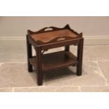 A George III style mahogany tray top occasional table, the detachable tray top with a shaped gallery