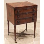 A George III mahogany gentleman's campaign dressing chest, the twin hinged top opening to an