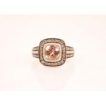 A peach topaz (untested) and diamond 14ct gold ring by Le Vian, the tiered cluster designed as a