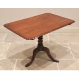 A 19th century mahogany centre/breakfast table, of cottage proportions, the rectangular top with