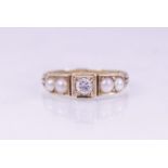 A Victorian and later diamond set 18ct gold ring, the central round brilliant cut diamond weighing