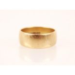 A 9ct gold wedding band, S&W, London 1973, ring size R 1/2, weight 5.7gms