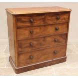A Victorian mahogany chest of drawers, the rectangular top with a moulded edge and rounded front