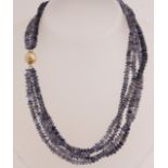 Necklace of iolite with gold