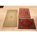 Three Oriental rugs