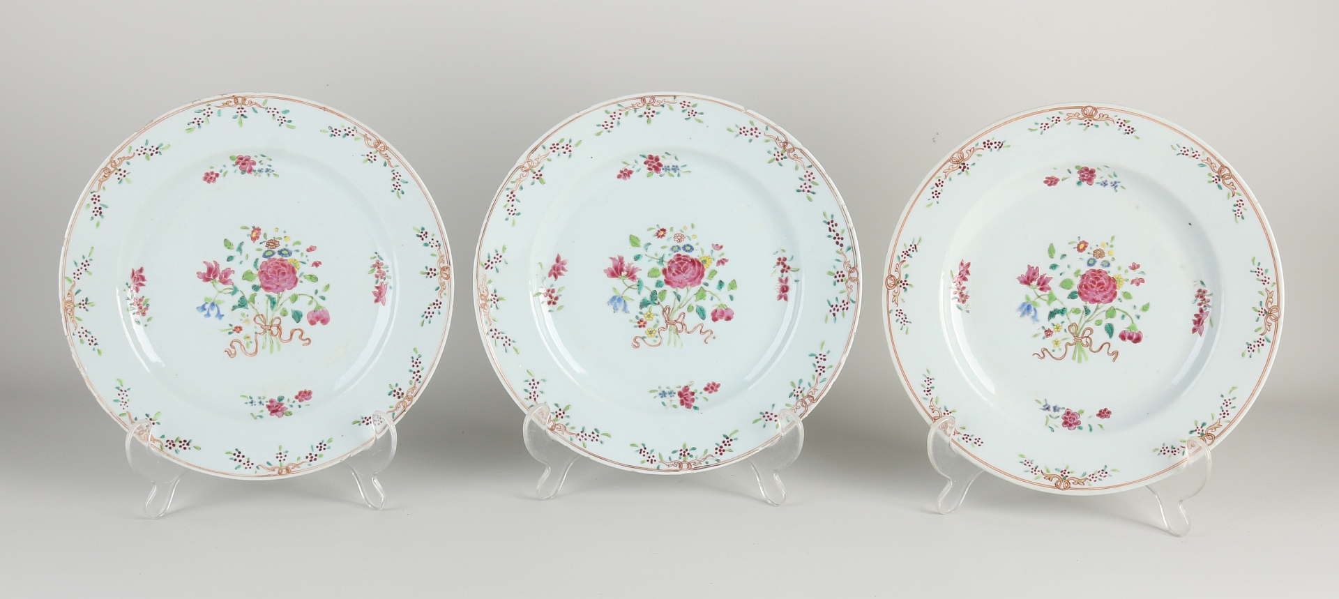 Three Chinese Family Rose plates Ø 23 cm.