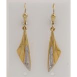 Pair of gold earrings