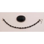 Silver bracelet and brooch with onyx