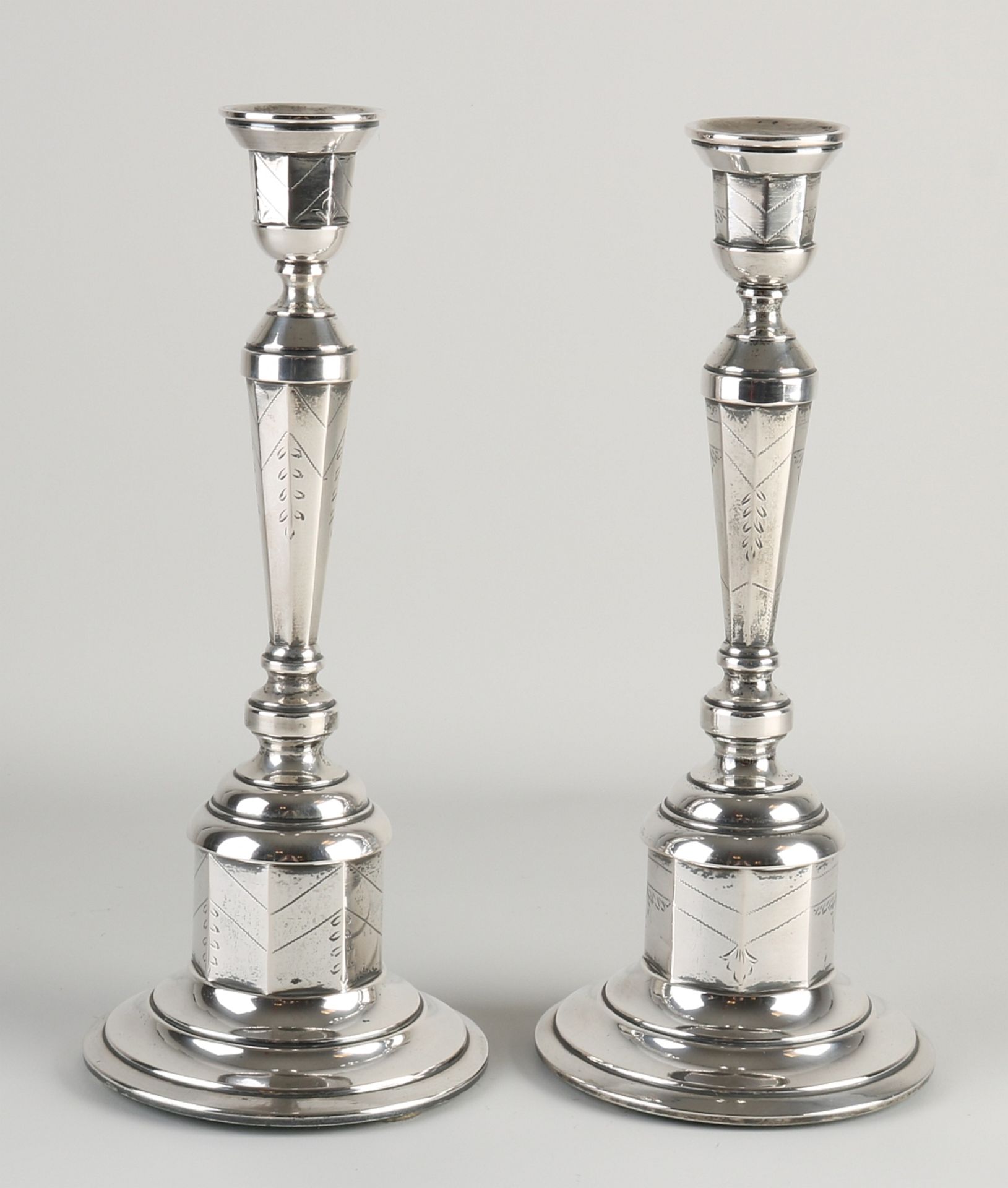 Two silver candlesticks