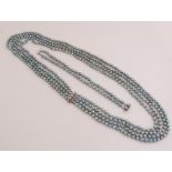 Capital necklace and bracelet of gray cultured pearls