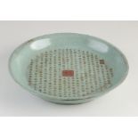 Chinese celadon dish with text Ø 29 cm.