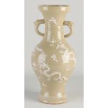 Chinese relief dragon vase, H 35 cm.