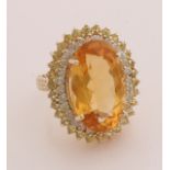Gold ring with citrine and diamond