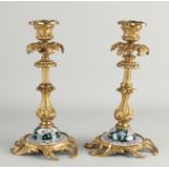 Two Family Noir candlesticks, H 24 cm.