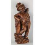 Wood-carved wall relief, Chimney sweep