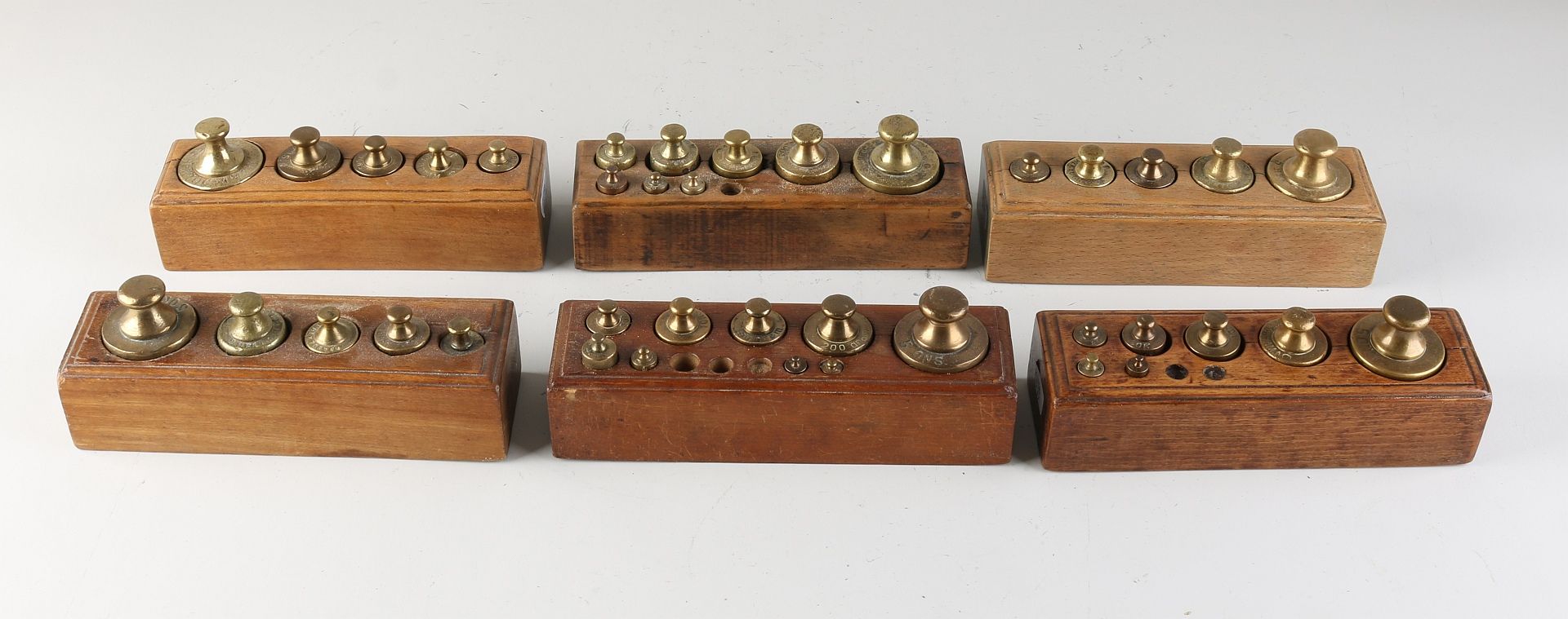Six antique weight blocks, 1900