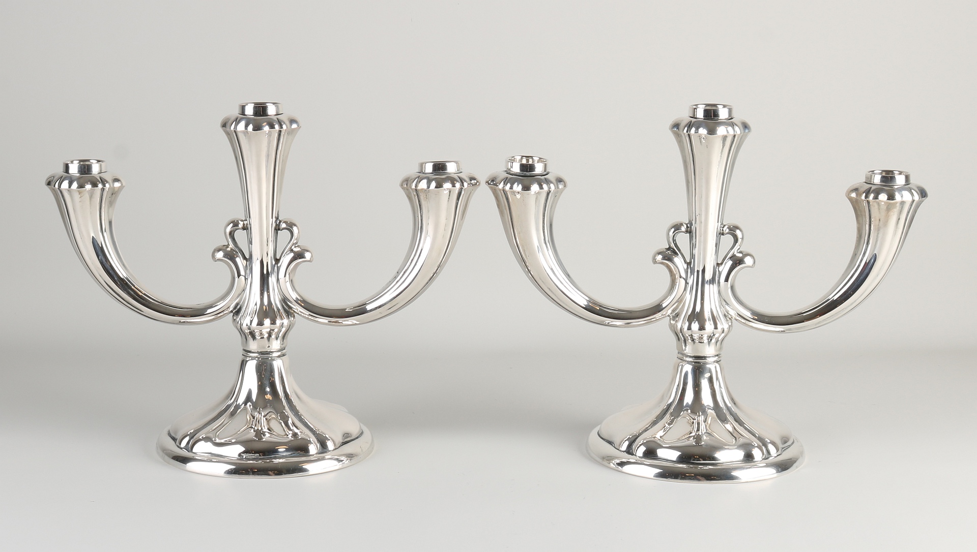 Two silver candlesticks