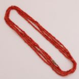 Long red coral necklace