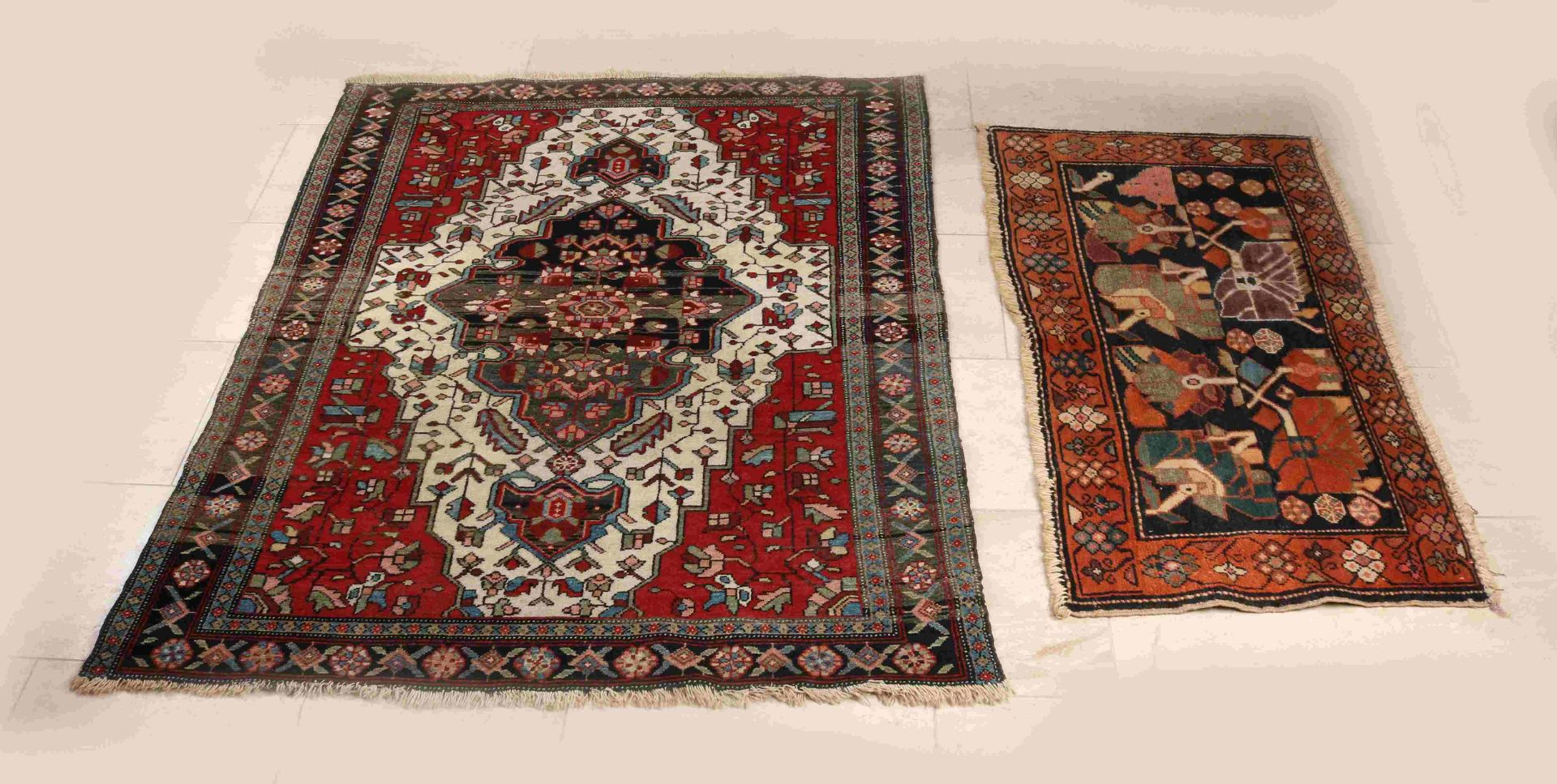 Two antique Persian rugs