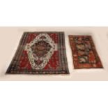 Two antique Persian rugs
