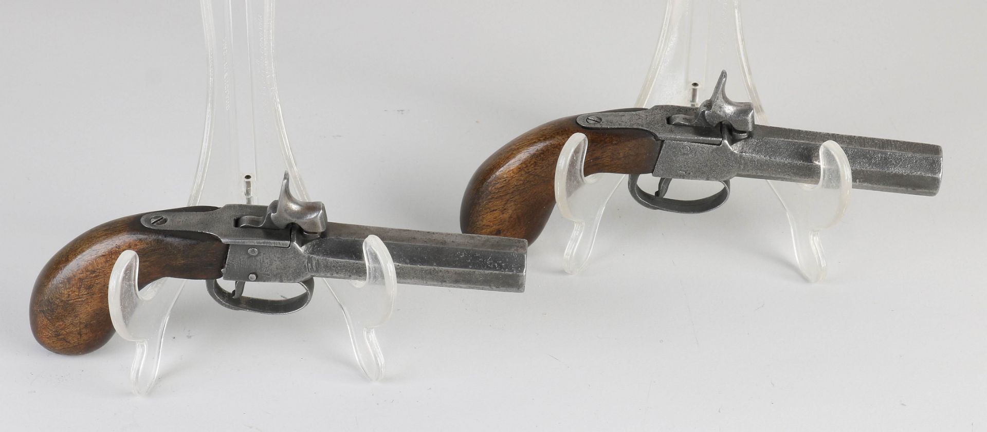 Two antique percussion pistols, L 18 cm.