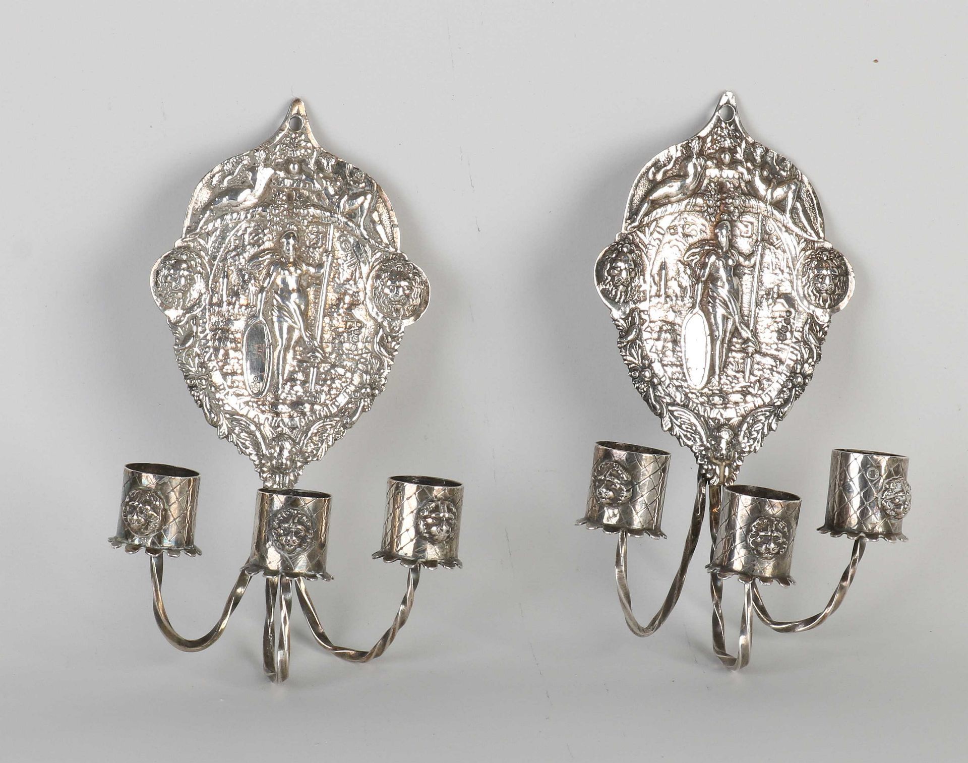 Two silver wall sconces