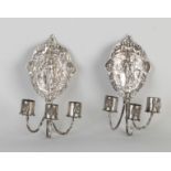 Two silver wall sconces