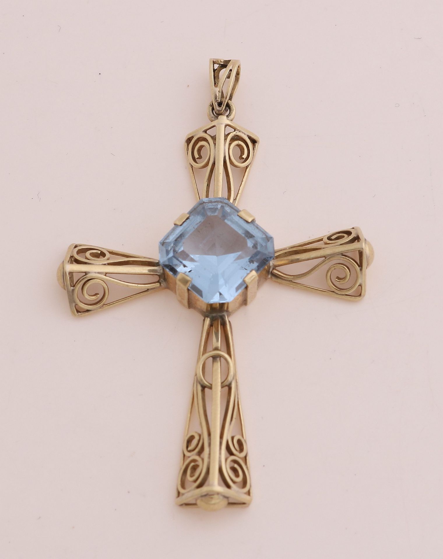 Golden cross with spinel