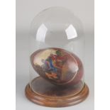 Lacquer egg under glass dome