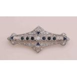 White gold art deco brooch with diamond and sapphire