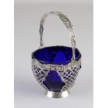 Silver sugar bowl with blue glass