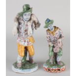 Two antique Delft figures