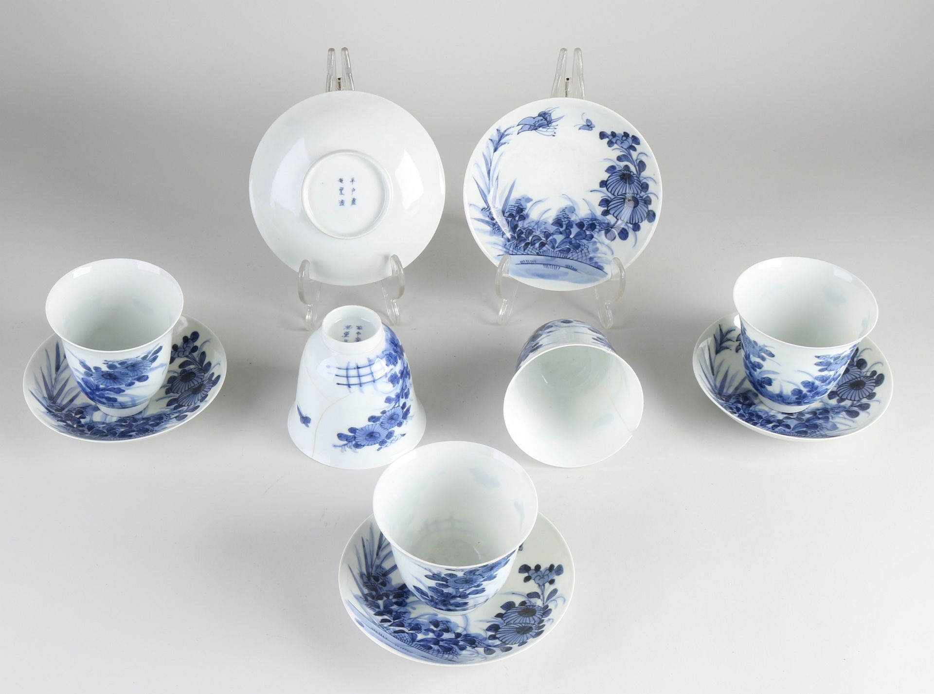 Five Japanese cups and saucers