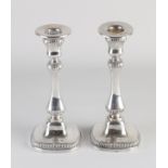 Pair of silver candlesticks