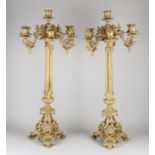 Two fire-gilded ecclesiastical candlesticks